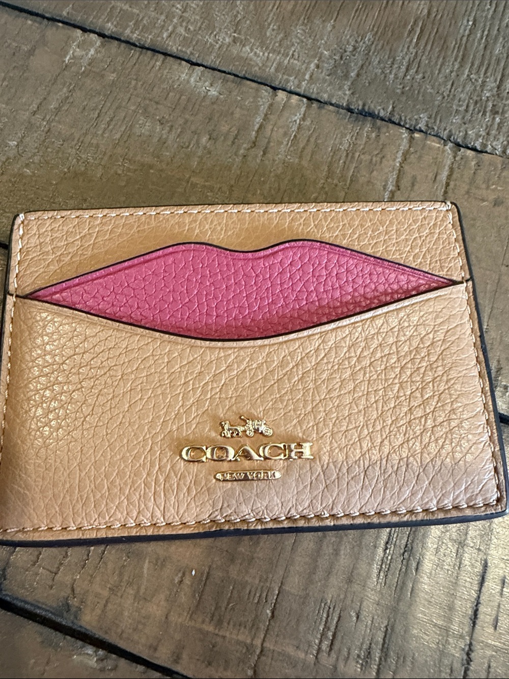 Coach Tan Leather Card Holder with Pink Lip Accent. Brand new